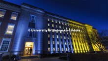Love Library on the Nebraska’s City Campus is bathed in blue and yellow lights to show the world o