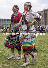 Jingle dress dancers Kaitlynn Miller and Tavia Miller perform a traditional dance during the 2022 UN