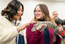 Students pet animals during the End of Year Bash inside the East Campus Union on Saturday, April 30,