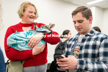 Students pet animals during the End of Year Bash inside the East Campus Union on Saturday, April 30,