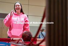 Students play carnival games during the End of Year Bash inside the East Campus Union on Saturday, A