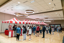 Students play carnival games during the End of Year Bash inside the East Campus Union on Saturday, A
