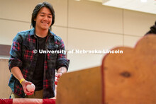 Students play carnival games during the End of Year Bash inside the East Campus Union on Saturday, A