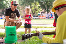 Discovery Day attendees listen to music while playing with toys. The East Campus Discovery Days and 