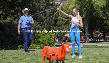 Gracie Jones, a freshman from Chadron, tries her hand at roping as Rodeo Club coach Marshal Peterson
