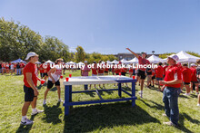 Students play Beer Die at the Student Tailgate and Unity Walk in the Union green space before the ga