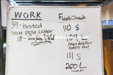 The repair schedule is made out on a white board. Outdoor Adventures Bike Shop located in the Outdoo