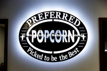 Lighted sign in the company offices. Preferred Popcorn grows popcorn near Chapman, Nebraska and thro