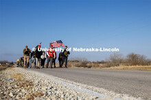 Ruck Marchers walk along Holdrege Street in eastern Lancaster County. Nebraska students and veterans