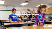 A student reacts to an idea Spencer Knight proposes to improve his car. Nebraska honors students Spe