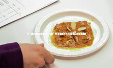 The winning entry, Great Indian Carrot Porridge, is plated and presented for the judges.

Groups pre