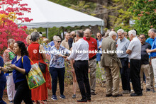 Maurenn Burson greets Chancellor Green during the May 11 celebration. Burson is part of a group that