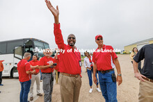 Chancellor Rodney Bennett waves to a group at the field day for area farmers at the South Central Ag