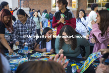 The Mexican American Student Association had an enthusiastic crowd at a large table playing Mexican 