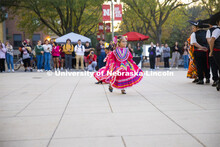 Dancers performing the traditional Mexican dance. Fiesta on the green at the Nebraska Union Plaza. F