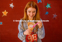 Hannah-Kate Kinney enjoys a waffle cone at Ivanna Cone. About Lincoln at Ivanna Cone in the Haymarke
