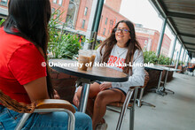 Grace Patel (right) and Isela Tercero on the patio of The Mill in the Haymarket. About Lincoln at Co