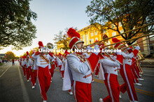 The Cornhusker Marching Band marches down R Street to begin the parade. Homecoming parade and Cornst