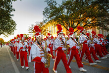 The Cornhusker Marching Band marches down R Street to begin the parade. Homecoming parade and Cornst