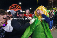 James Lynch with Phi Kappa Psi is mobbed by his friends after winning the jester competition. Homeco