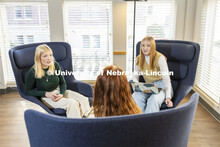 Madalyn Schoneman, left, Alexis Tenorio and Sarah Danahy study in the Knoll Residential Center loung