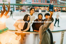 Students stop for a selfie at the Railyard Rink. Ice skating in the Haymarket. Photos for About Linc