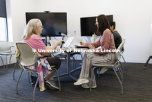 Jessie Kohn (right), Lecturer in Special Education and Communication Disorders, talks with Rhonda He