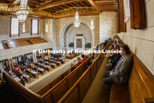 Students and faculty who attended I Love NU Day gather on the balcony in the Nebraska State Capitol 