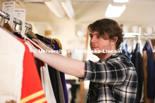 Hunter Rock organizes costumes for UNL’s production of “Big Fish”. April 23, 2024. 