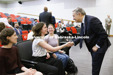 Canadian Minister Francois-Philippe Champagne, talks with Victoria Diersen, center along with Jordyn