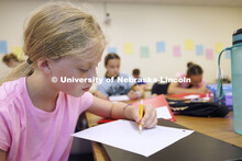 Students in the I/We Love to Write Workshop for kids. Nebraska Writing Project, an initiative of the