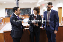 Lecturer Rachel Tomlinson Dick, center, talks with students in the Housing Justice Clinic. College o