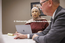 Professor Kevin Ruser meets with law students in the Immigration Clinic. College of Law Clinics. Sep