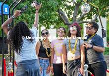Students take a photo together. Fiesta on the green at the Nebraska Union Plaza. Fiesta on the Green