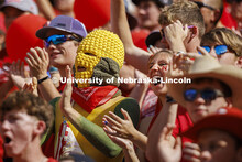 Ryan Jensen, a senior from Lincoln, wore his own version of a corn head knitted by his girlfriend, E