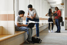 Students in the hallway in the Raikes Center. Raikes School photoshoot. October 9, 2024. 