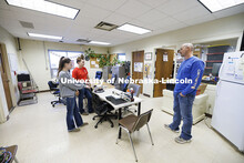 Breanna Gilmore and McKenna Carr talk with animal science research manager Brent Johnson about the d