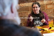 Ri Kreiner, a graduate student (right), speaks in German with Robert Shirer, Emeritus Associate Prof