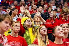 A student in a corn suit dances to music during the Nebraska vs. Illinois Volleyball game. October 2