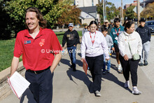 NSE student ambassador Michael Allen (left) leads families on a tour across campus during Spanish Vi