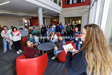 NSE student ambassador Ashleigh Welch speaks with families during Spanish Visit Day. October 26, 202