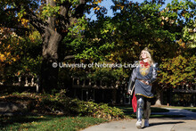 Junior geology major Nikki Elm walks on campus dressed as King Arthur for Halloween. Halloween on ca