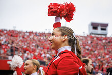 Cheerleader Madi Lundy watches the Nebraska vs UCLA football game. Huskers vs. UCLA Game. November 2