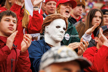 A fan dressed as Michael Meyers lurks in the crowd at the Nebraska vs UCLA football game. November 2