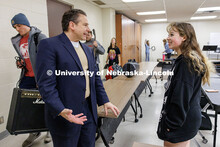 Robert Woody, Steinhart Foundation Distinguished Professor of Music, speaks with senior Faith Steven