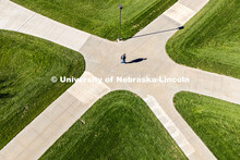 Students crossing campus on a sunny fall afternoon. November 11, 2024. 