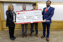 Trey Johnson and Joey Idstein stand with their second-place check. Fall 2024 Center for Sales Role-P