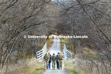 Army ROTC cadet Joe Wiese (from left), Nebraska National Guard member Cory Zelfel, cadet Malorie Mul