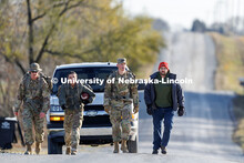 Army ROTC cadet Joe Wiese (from left), Nebraska National Guard member Cory Zelfel, cadet Malorie Mul