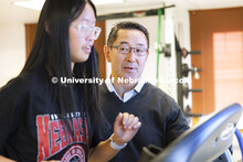 Shinya Takahashi talks with Lauren Marshall as she runs on the treadmill. Takahashi, Associate Profe